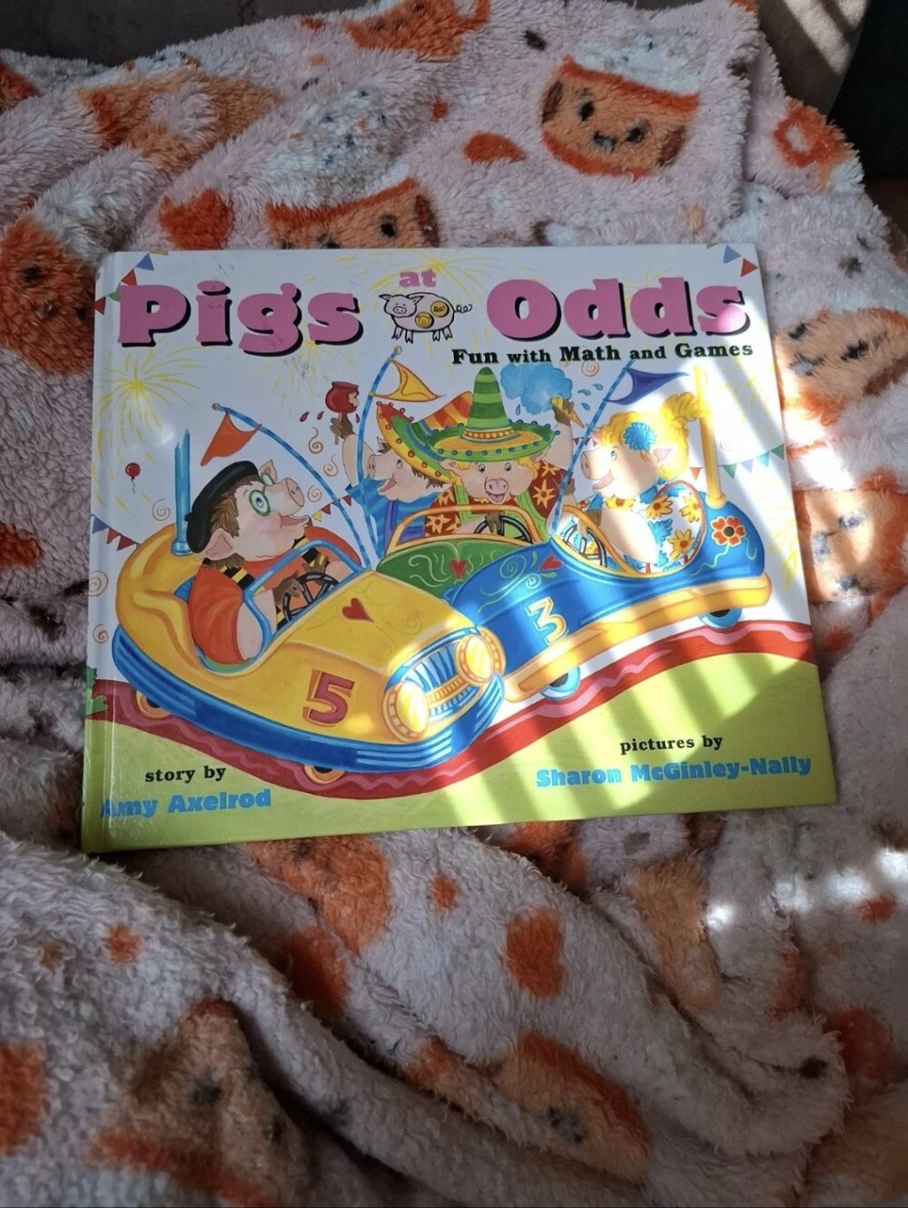 Pigs at Odds Kids Book - Colorful Yellow & Blue Cover